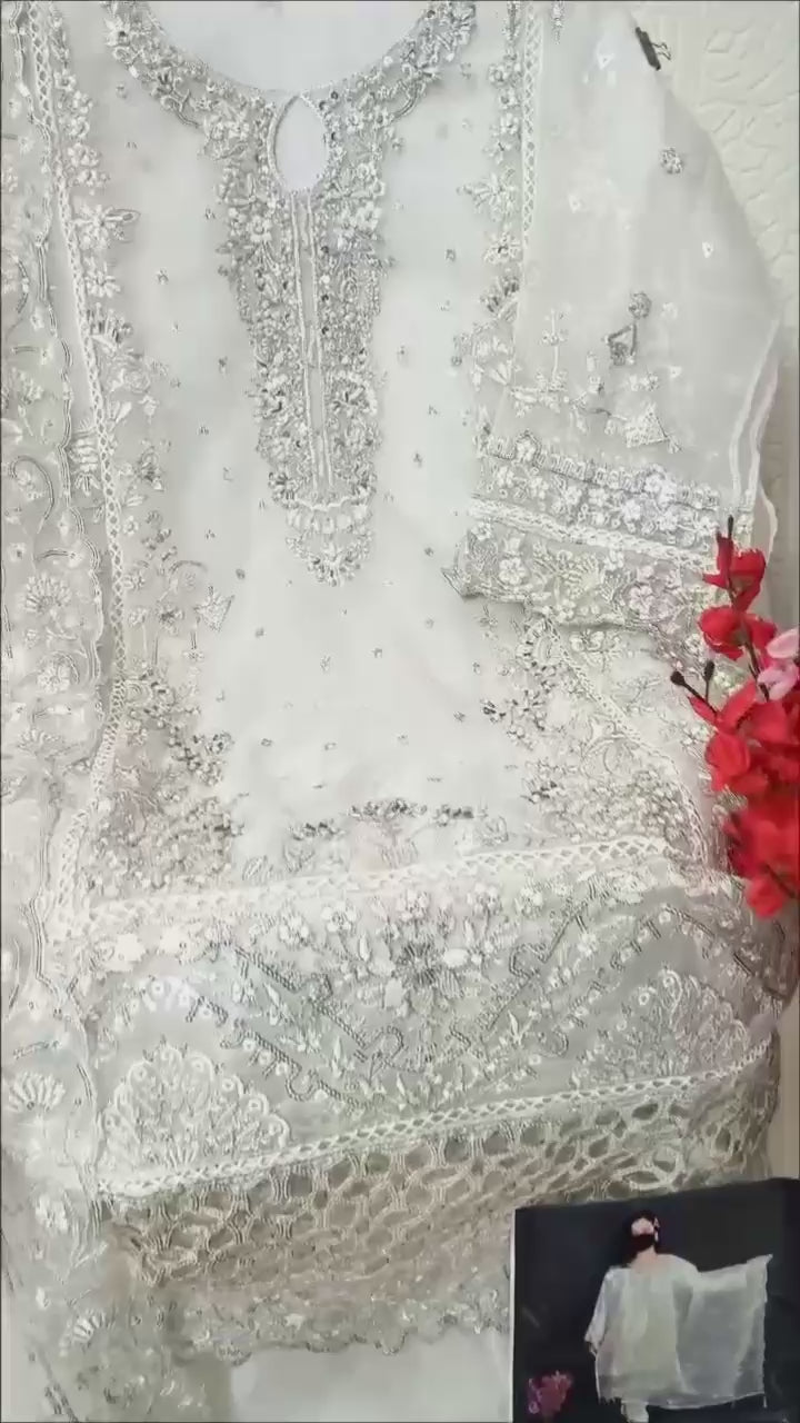 Load video: Luxury Semi-Stitched Ensemble in Premium Organza