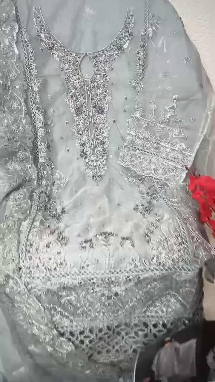 Load video: Luxury Semi-Stitched Ensemble in Premium Organza